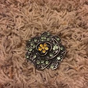 Antique brooch with yellow and peridot rhinestone